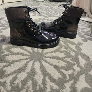 NWOT. Michael Kors patent leather rain boots with brown logo monogram detail.